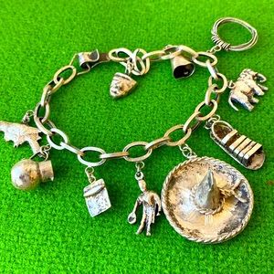 Vintage hand made Mexico sterling silver 10 charms bracelet